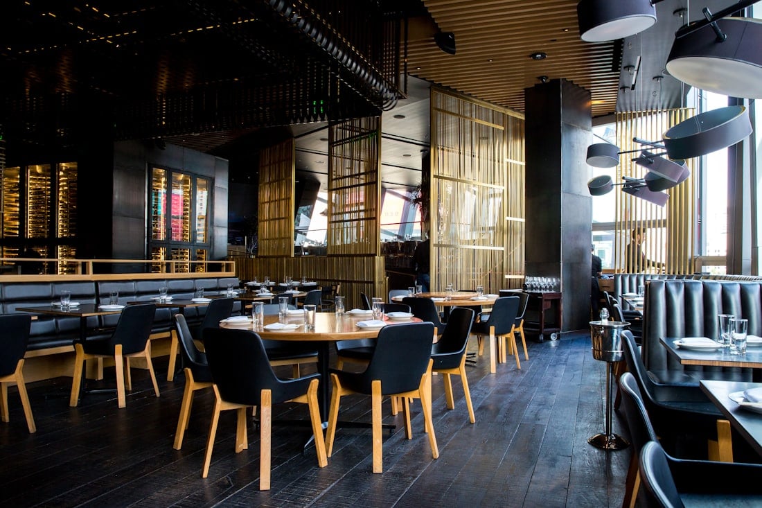 A small restaurant floor with tables